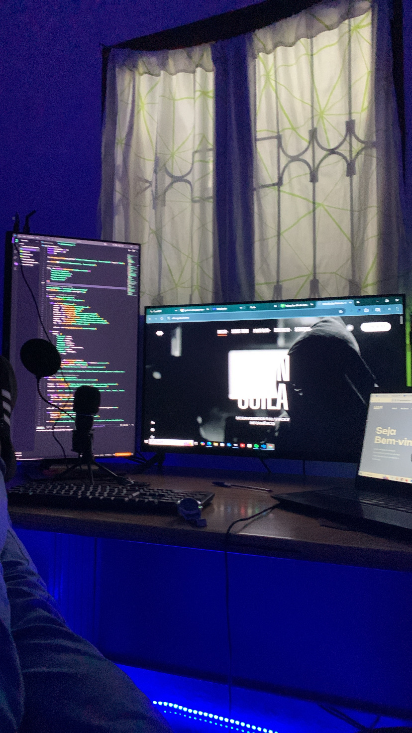 Development workspace with multiple screens and code